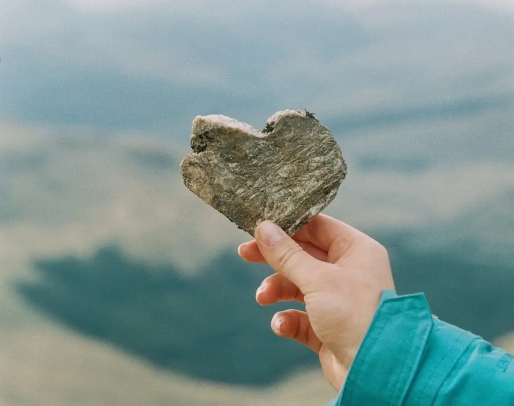 Heart-shaped rock symbolizing self-understanding and acceptance