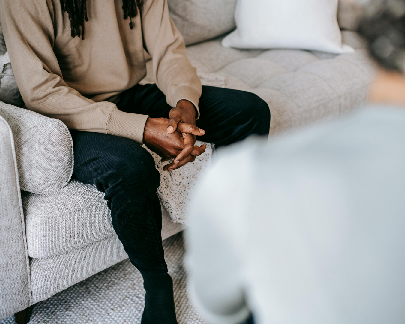Therapist speaking with a client during a counseling session about EMDR therapy
