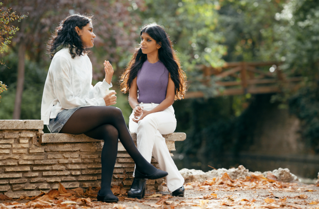 Talking with a supportive friend to process emotions and reduce mental clutter