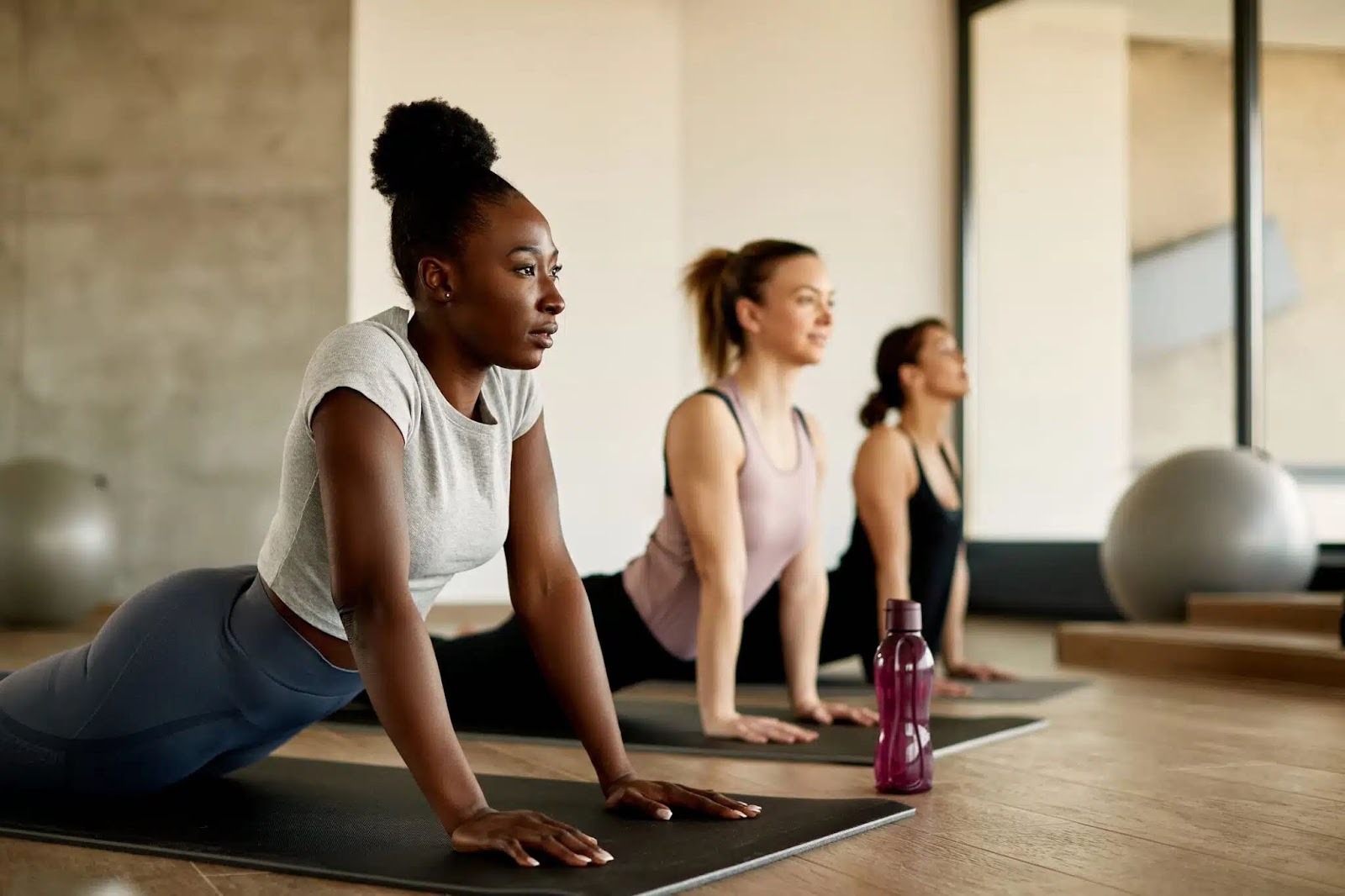 Woman doing yoga in a room