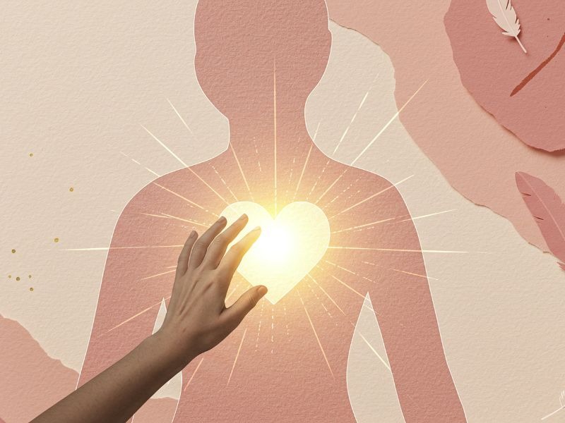 Hand reaching toward a glowing heart symbol on a layered silhouette of human figures, symbolizing healing and self-compassion