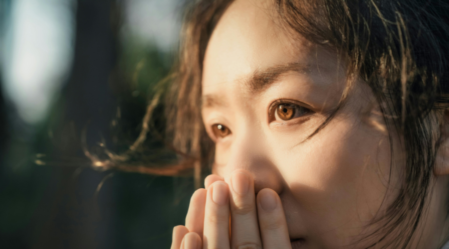 Close up of a person's face while in deep thought. 