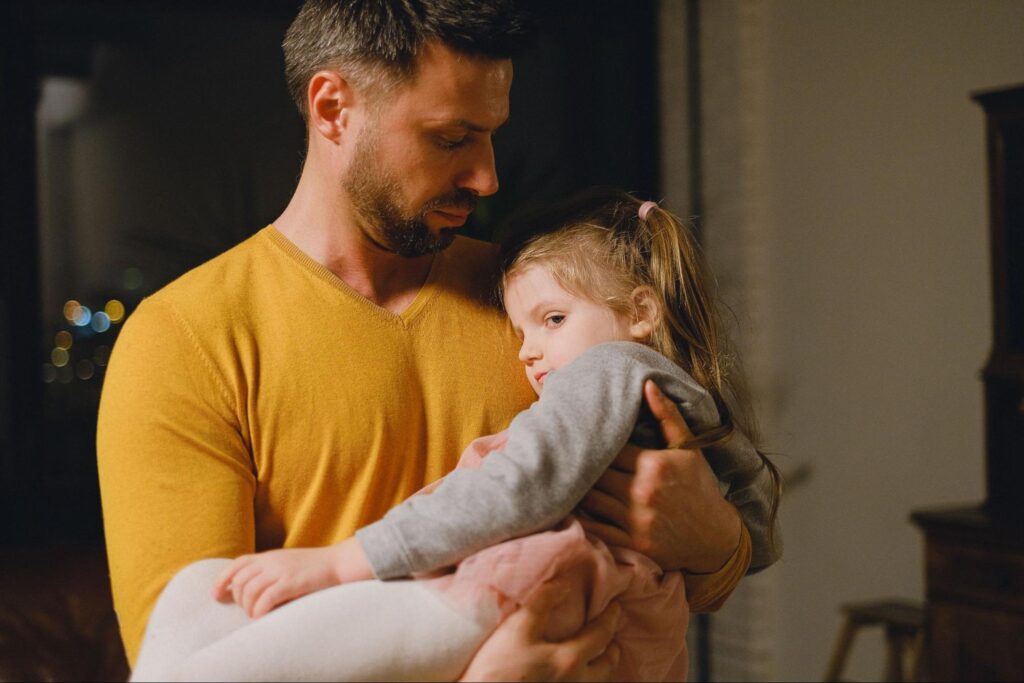 Parent comforting their child’s anxiety at home